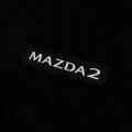 logo na dywanikach do mazdy 2 hybrid.webp
